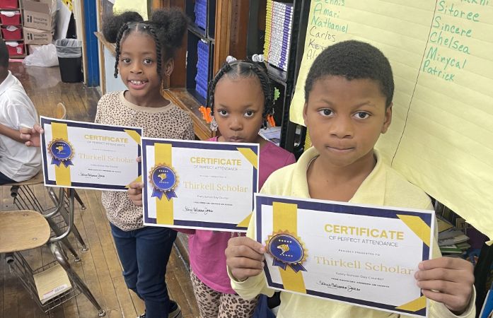  students holding perfect attendance award